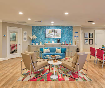 living room featuring hardwood flooring and TV, Oasis Townhomes