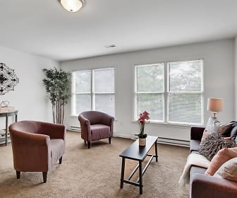 living room featuring carpet, natural light, and baseboard radiator, Parkview Place