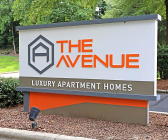 view of community sign, The Avenue Apartments