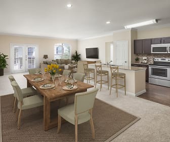 dining area with carpet, natural light, stainless steel microwave, TV, and range oven, Camden Riverwalk Apartments