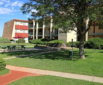 view of nearby features featuring an expansive lawn, Belmont Square