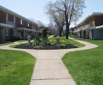 surrounding community featuring a large lawn, Cedarwood Apartments