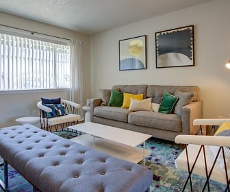 living room featuring hardwood floors and natural light, ReNew Park Blu