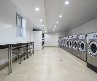 clothes washing area with tile floors and independent washer and dryer, Pelham Parkway Towers