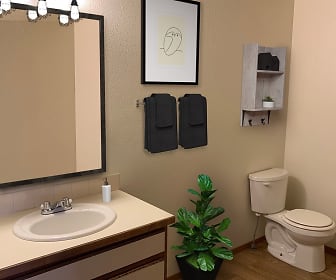 half bath with hardwood floors, mirror, toilet, and vanity, Shiloh Glen Apartments