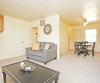 carpeted living room with natural light and a ceiling fan, Golfview Village
