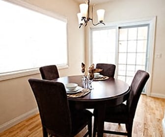 dining space with a notable chandelier, hardwood floors, and plenty of natural light, The Residences At Toscana Park