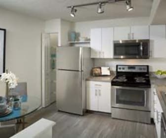 kitchen featuring stainless steel appliances, range oven, white cabinets, and dark hardwood floors, Camden Portofino