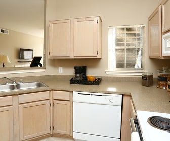 kitchen with natural light, range hood, dishwasher, TV, light flooring, and light brown cabinets, Champion Lake