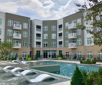 view of property featuring a swimming pool, Lofts at Zebulon