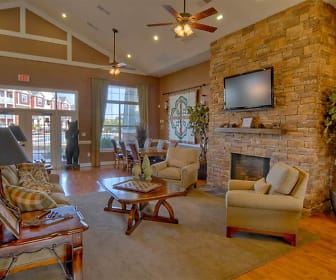 living room with hardwood flooring, a fireplace, lofted ceiling, natural light, a ceiling fan, and TV, Haven at Knob Creek