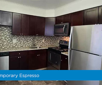 kitchen with electric range oven, stainless steel appliances, granite-like countertops, light flooring, and dark brown cabinets, Eatoncrest Apartment Homes