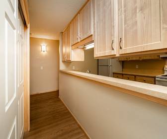 hallway featuring hardwood floors and electric range oven, Park Villa Apartments