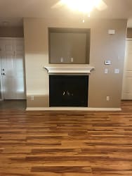 Gas fireplace with entertainment nook in living room