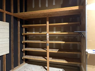 Oversized Garage Extra Storage Shelves & Loft.jpg