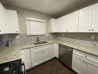 Full Kitchen Remodel with Granite and Designer Tile Back Splash
