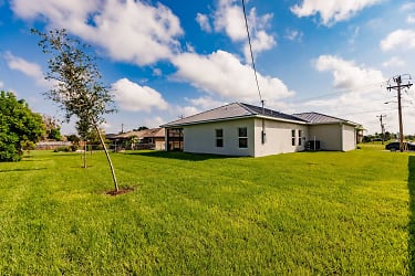 218 NW 3rd Pl - Cape Coral, FL