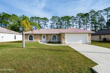 120 Point of Woods Dr - Palm Coast, FL