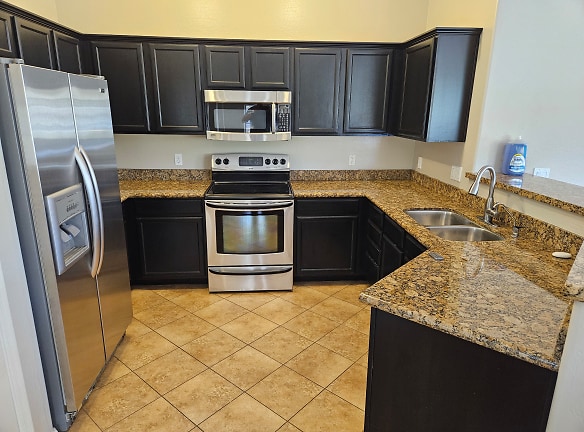 Luxury kitchen with granite countertops and breakfast nooks!