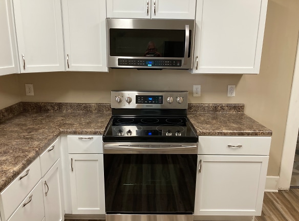 Stainless steel range/oven and large microwave