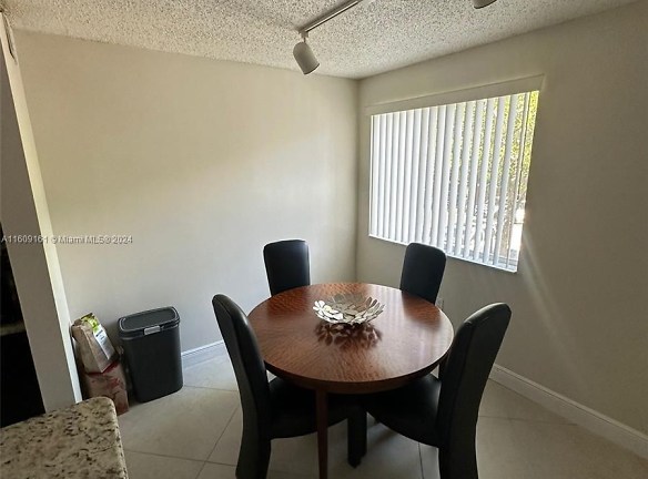 3830 Lyons Rd #203-3 - Coconut Creek, FL