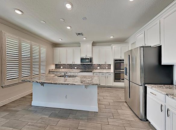 8931 Lookout Pointe Dr - Windermere, FL