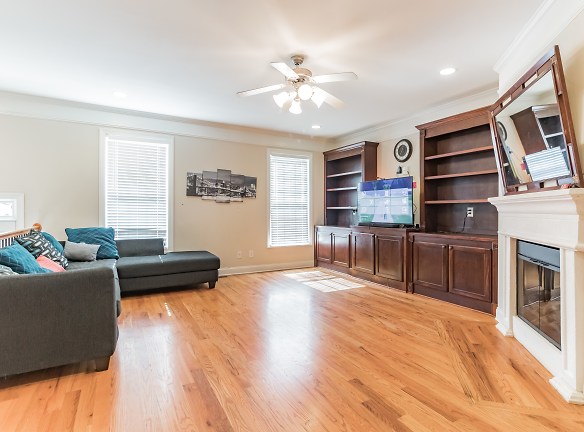 Family Room On Main With Built-In Bookcases,  Fireplace And Hardwood Floors